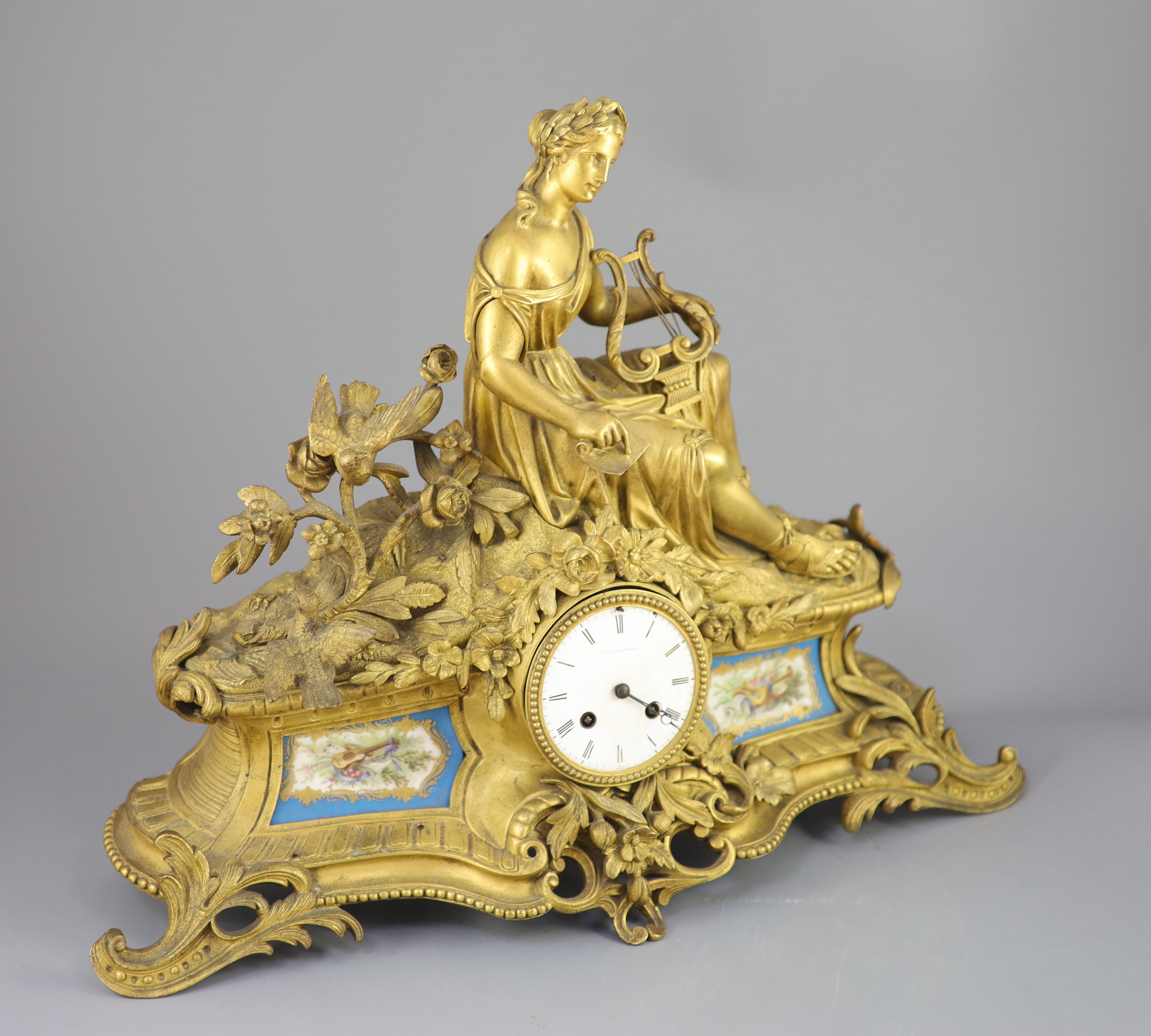 A 19th century French ormolu mantel clock, retailed by J & W Marshall, Paris, width 22.5in.